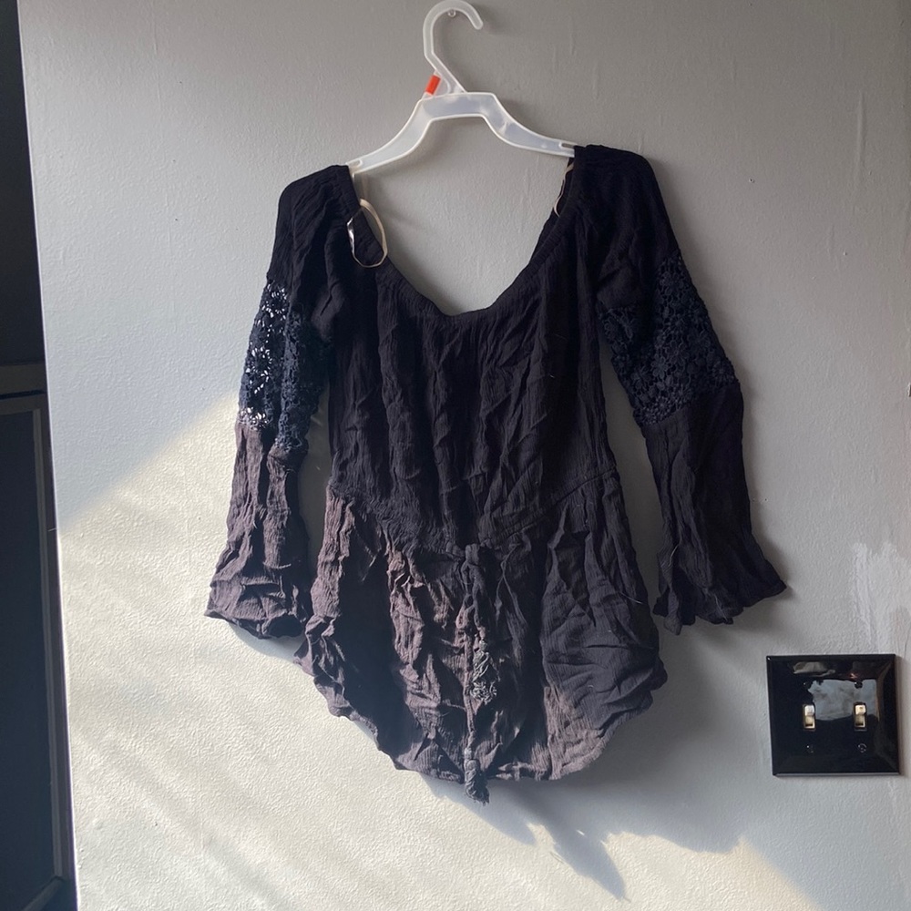 Black long sleeve shirt with many simple designs